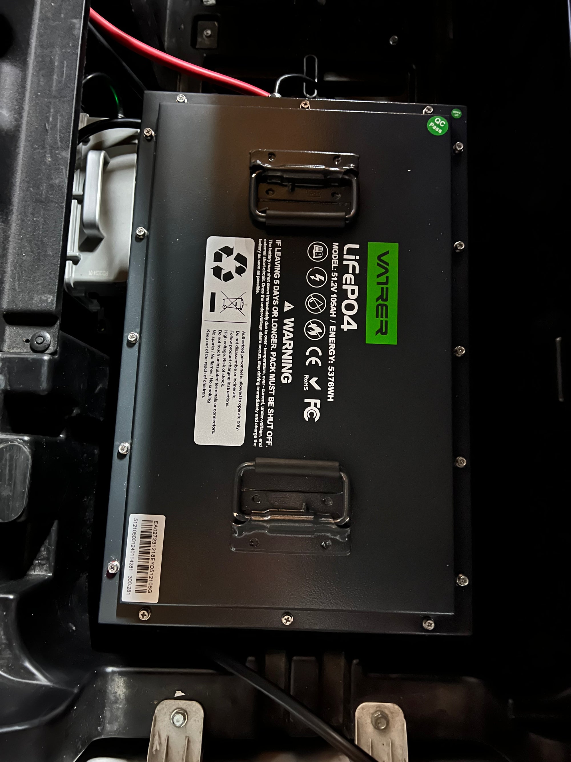 Users install the golf cart lithium battery into the Costco golf cart 18