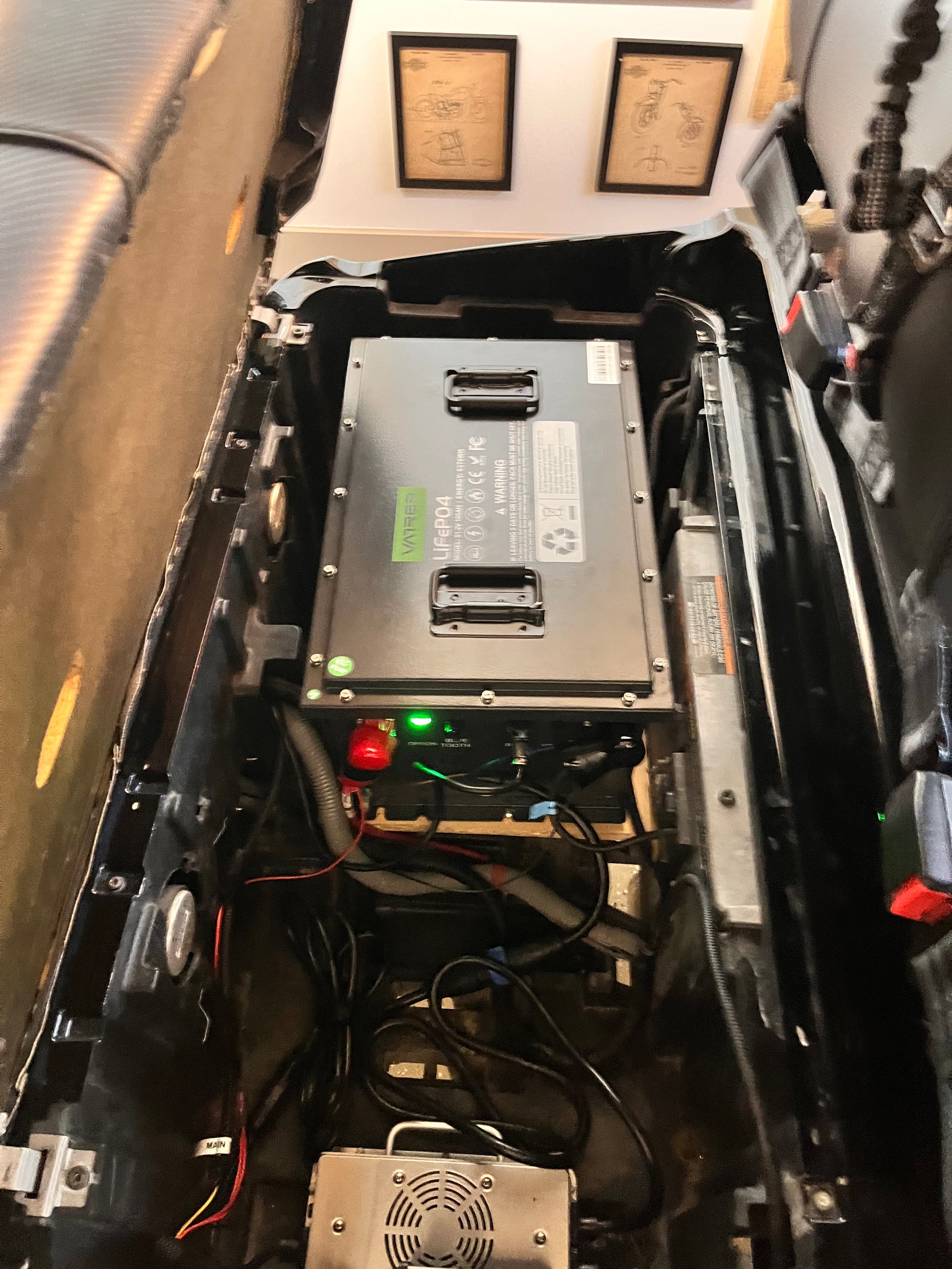 Users install the golf cart lithium battery into the Mission Golf Cart 18