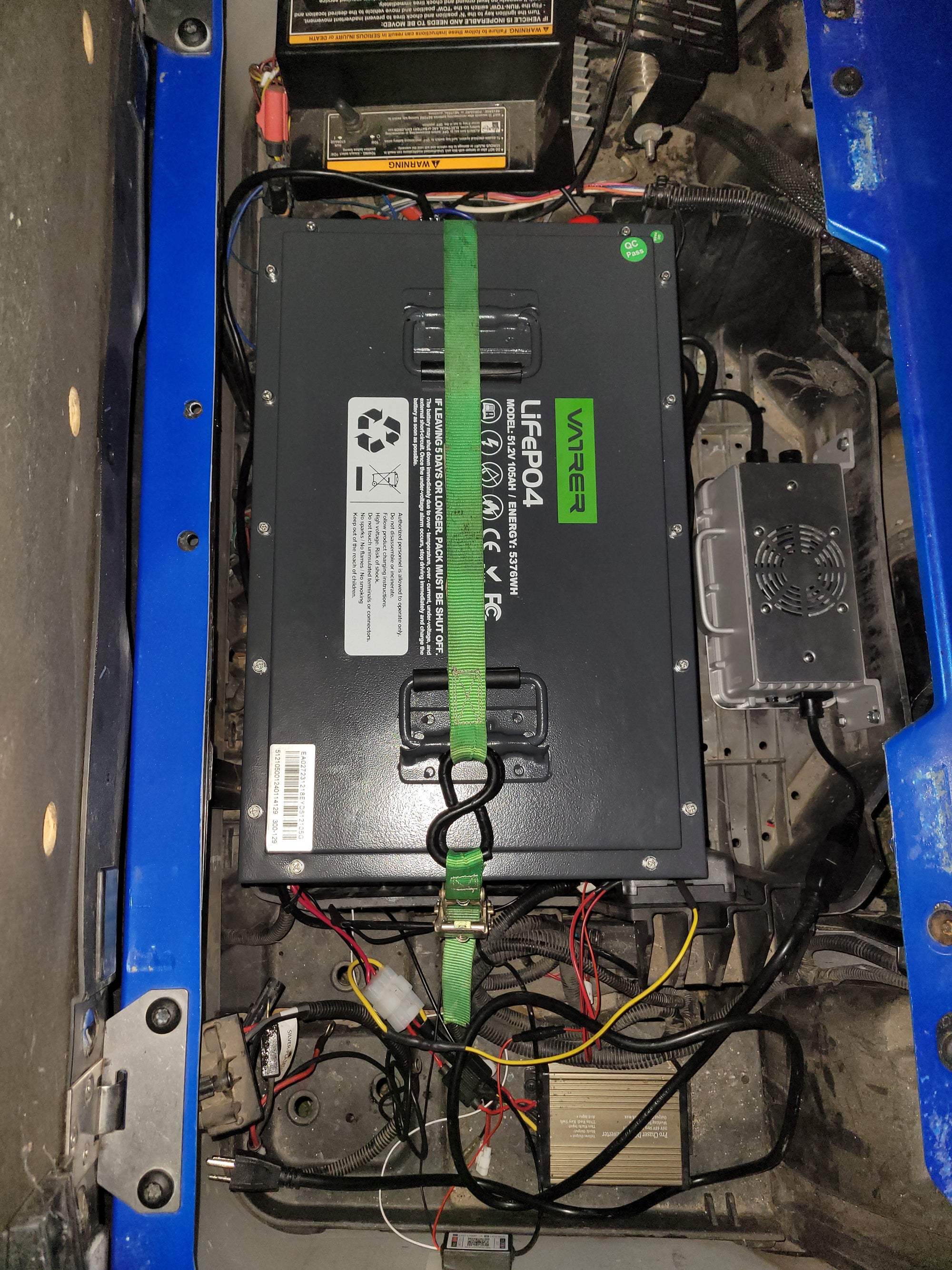 Users install the golf cart lithium battery into the American Custom Golf Carts (ACG) 18